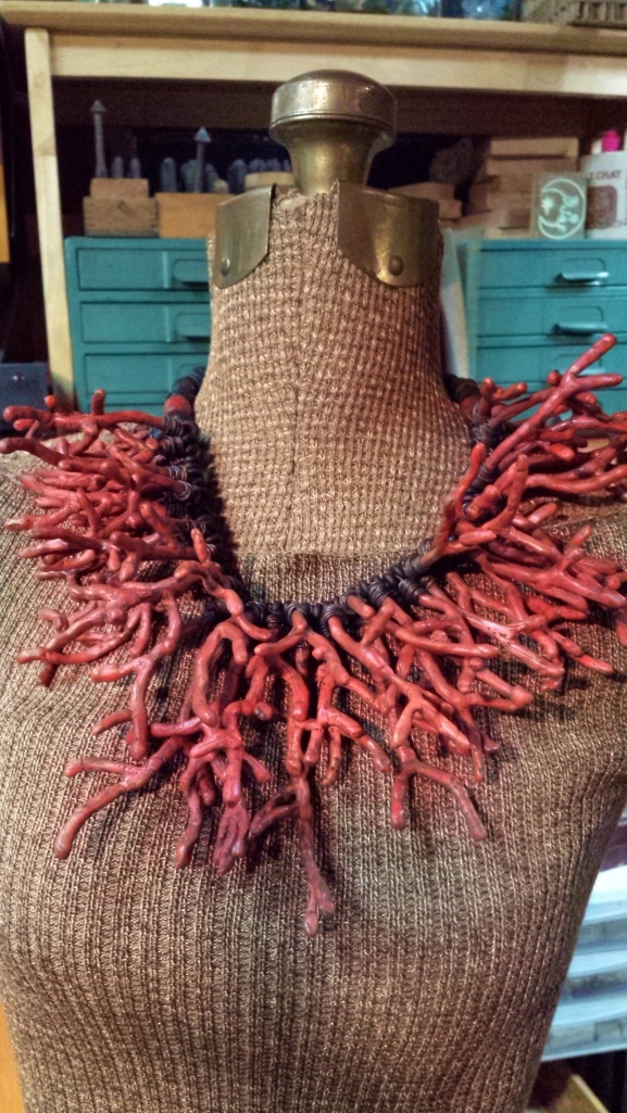 I've nicknamed this the feral coral necklace, but it will have a beautiful new name by tomorrow.  All polymer clay. I made an armature for each piece of faux coral.